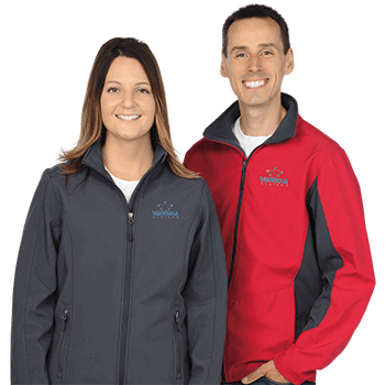 Katie & Joe wearing embroidered jackets
